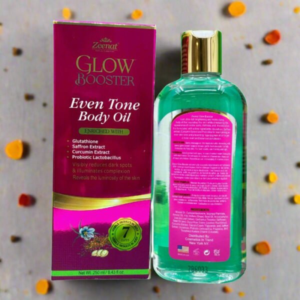 Zeenat Glow Booster Even Tone Body Oil 250ml packaging and bottle, displayed with flower petals.